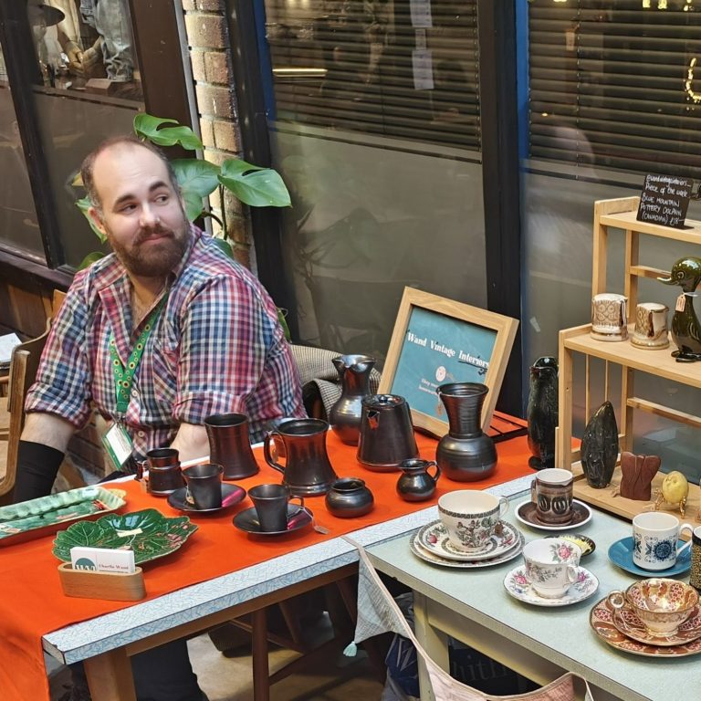 Charlie Wand, owner of Wand Vintage, a vintage decor and interiors shop based in Exeter Devon at a vintage market