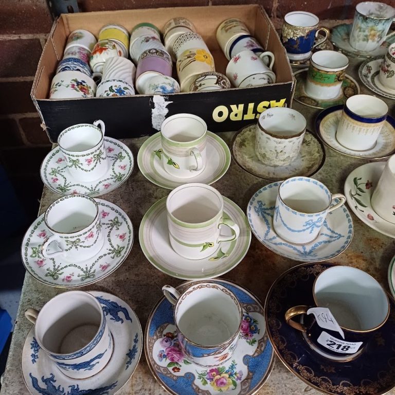 a selection of teacups at an auction for Wand Vintage Devon sourcing service for brides, weddings and wedding planners