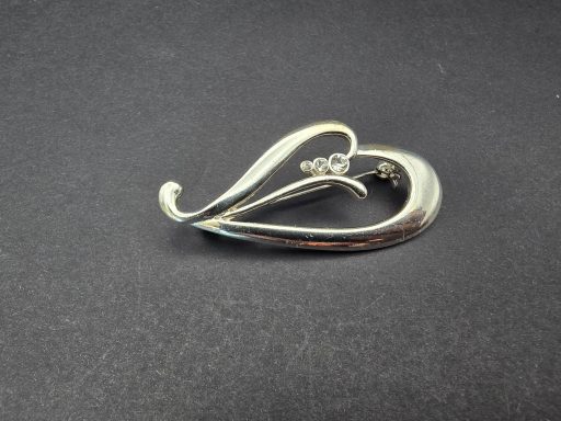 Vintage silver tone stylized leaf brooch