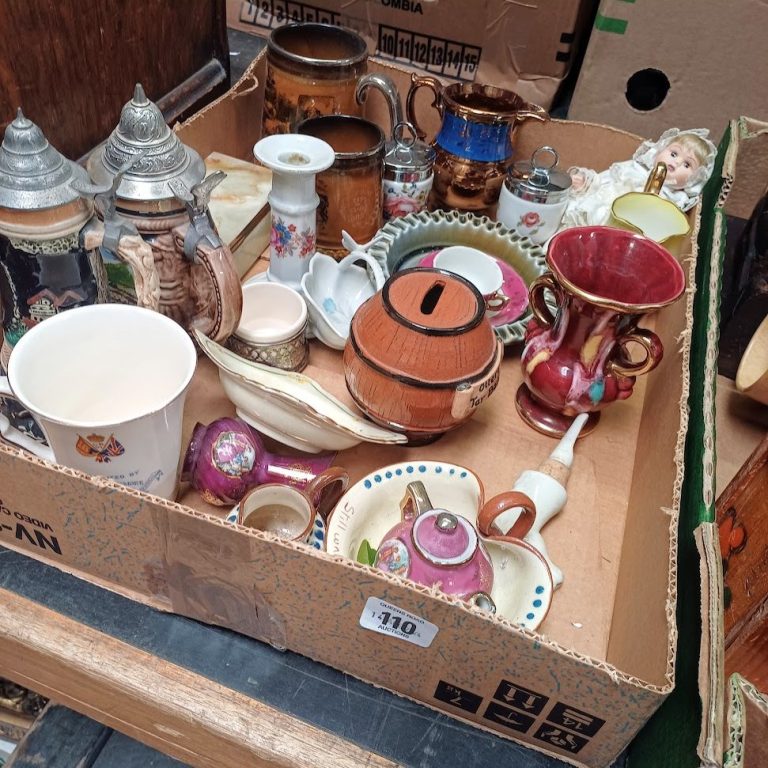 a selection of antique and vintage ceramic items at an auction for Wand Vintage Devon sourcing service for collectors and interior designers