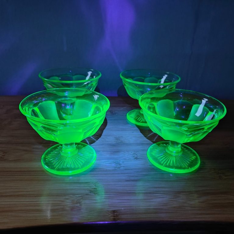 vintage uranium glass dishes glowing green under UV light